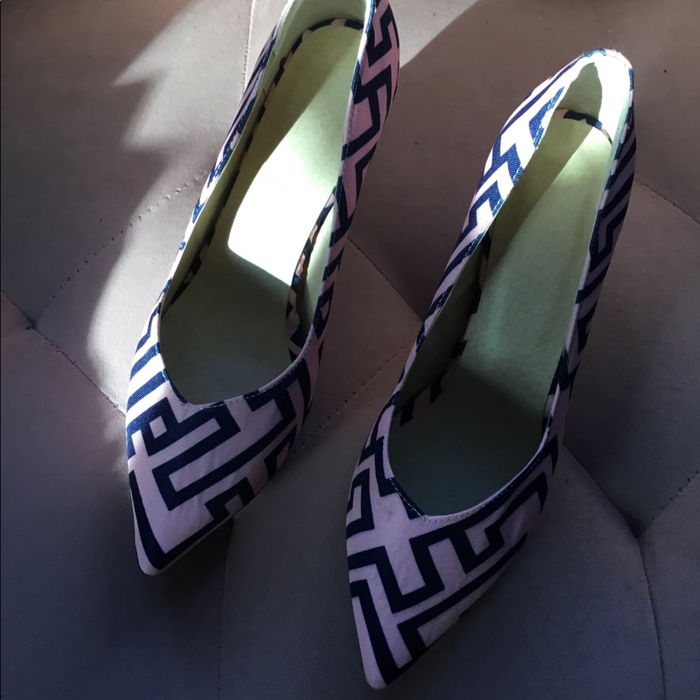 Shoes, pink zig zag lines and very fun. Kitten heel.